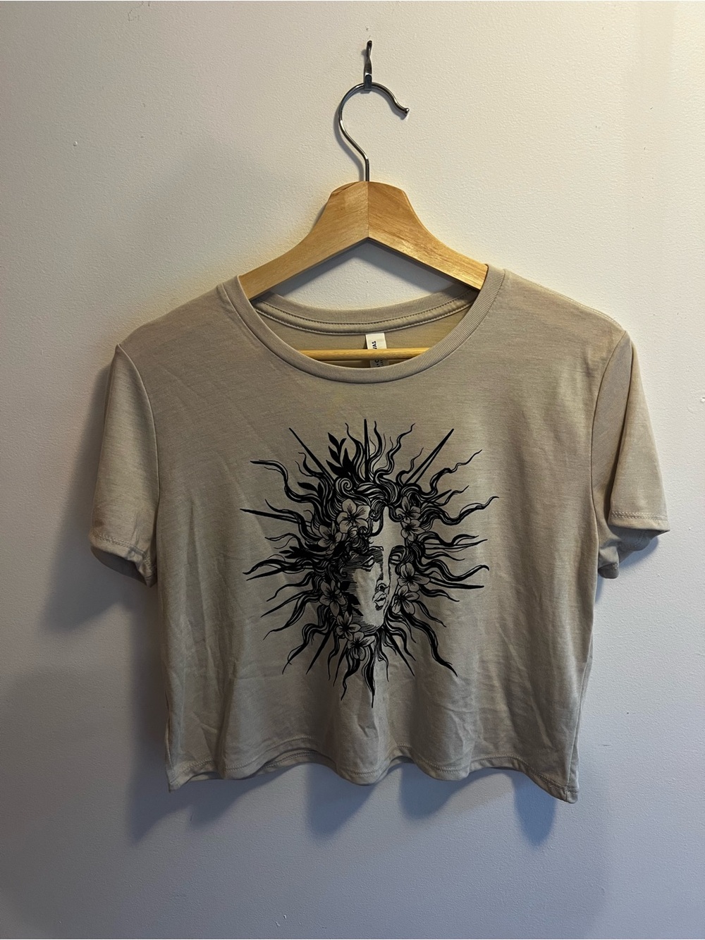 Bella Canvas Beige Cropped Tee with Black Sun Face Graphic